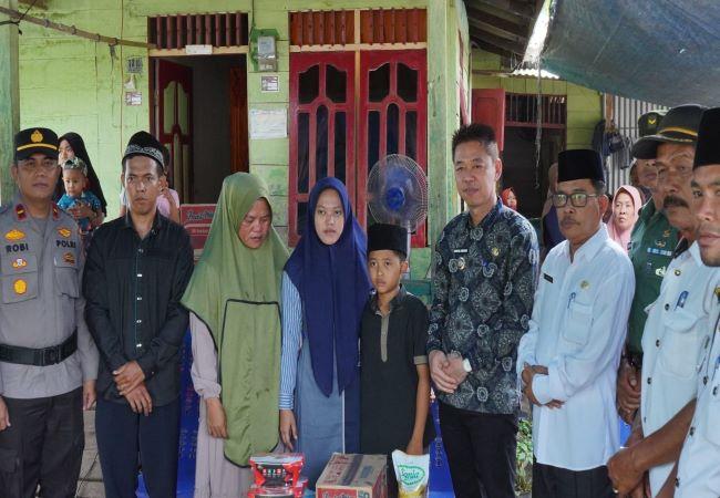 Kunjungi Keluarga Korban Dimangsa Buaya, Bupati Rohil Minta Regulasi Khusus
